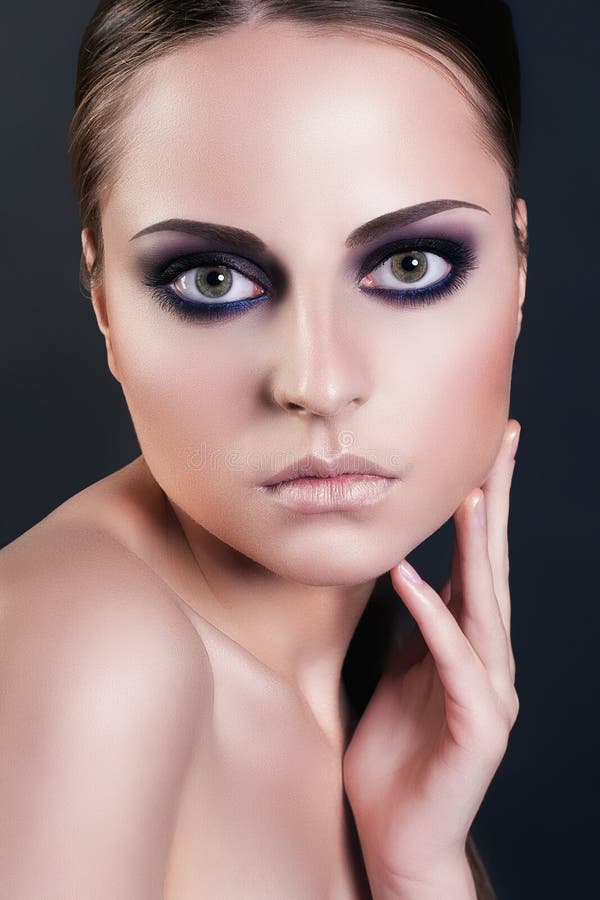 Fashion Beauty Portrait of Attractive Young Woman with Smokey Eyes Make ...