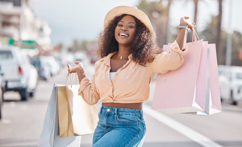 Fashion Black Woman with Shopping Bags in City or Happy with Sale ...