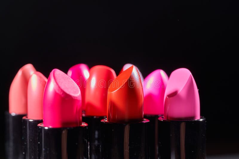 Fashion Colorful Lipsticks over black background. Lipsticks closeup royalty free stock photography Fashion Colorful Lipsticks over black background. Lipsticks closeup royalty free stock photography