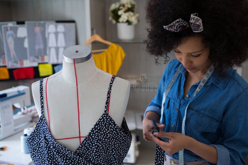 Fashion Designer Designing a Dress on Mannequin Stock Photo - Image of ...