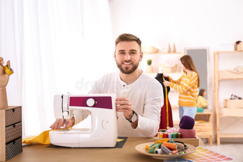 Fashion Designer Sewing New Clothes with Machine Stock Photo - Image of ...