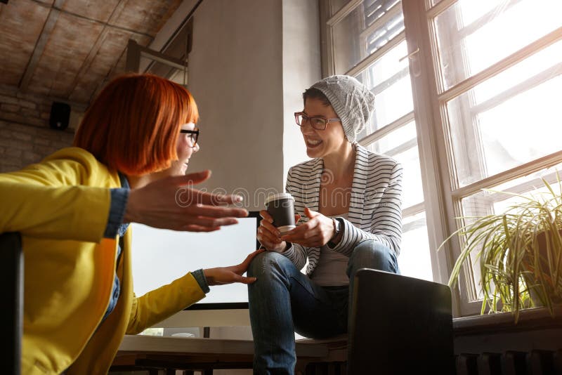 Fashion designer talking at studio royalty free stock photo Fashion designer talking at studio royalty free stock photo