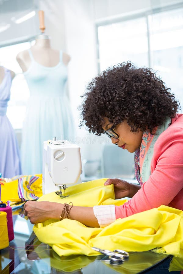 Fashion Designer Using Sewing Machine Stock Photo Image of person