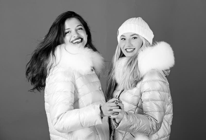 Fashion Friends. Winter Clothes. Women Wear Down Jacket with Furry Hood  Stock Image - Image of jackets, pretty: 218930803