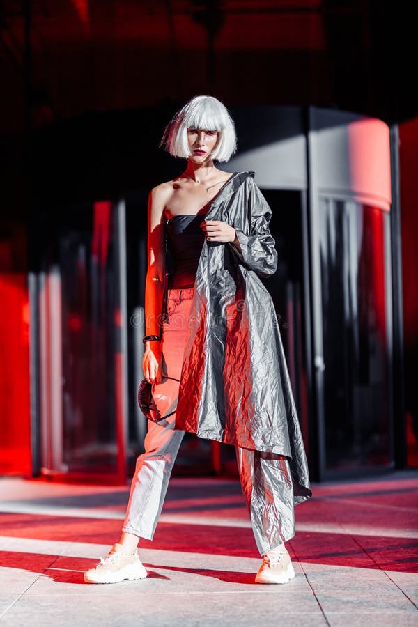Fashion of the Future. Futuristic Blonde in Red Space Stock Image