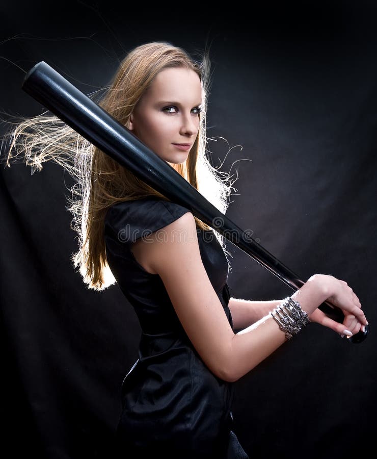 Fashion girl with the baseball bat