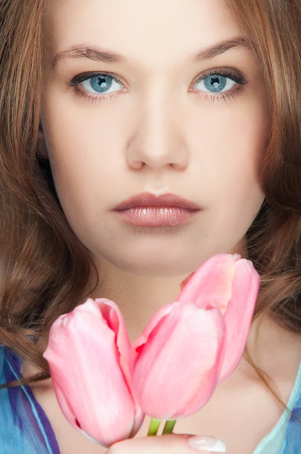 Fashion girl with tulips portrait