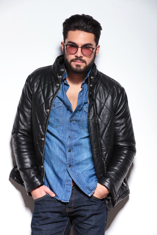 Fashion Man with Glasses and Leather Jacket Posing Stock Image - Image ...