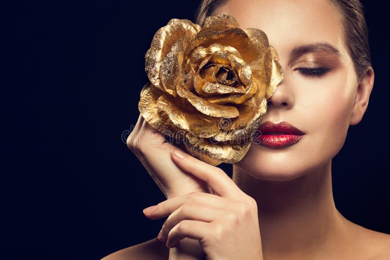 Fashion Model Beauty Portrait with Gold Rose Flower, Golden Woman Luxury Makeup an Rose Jewelry