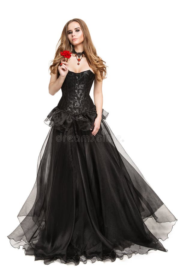 Fashion Model in Black Corset Vintage Dress smelling Red Rose Flower, Beautiful Woman Portrait in Evening Gown