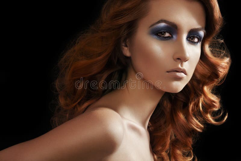 Fashion model face. Glamour make-up, shiny hair