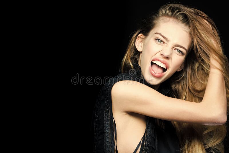 Fashion model pose isolated on black background. stock images Fashion model pose isolated on black background. stock images