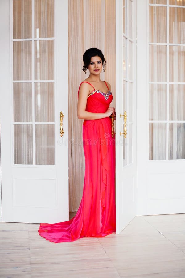 Fashion photo of beautiful lady wearing sparkling evening dress stock photo Fashion photo of beautiful lady wearing sparkling evening dress stock photo