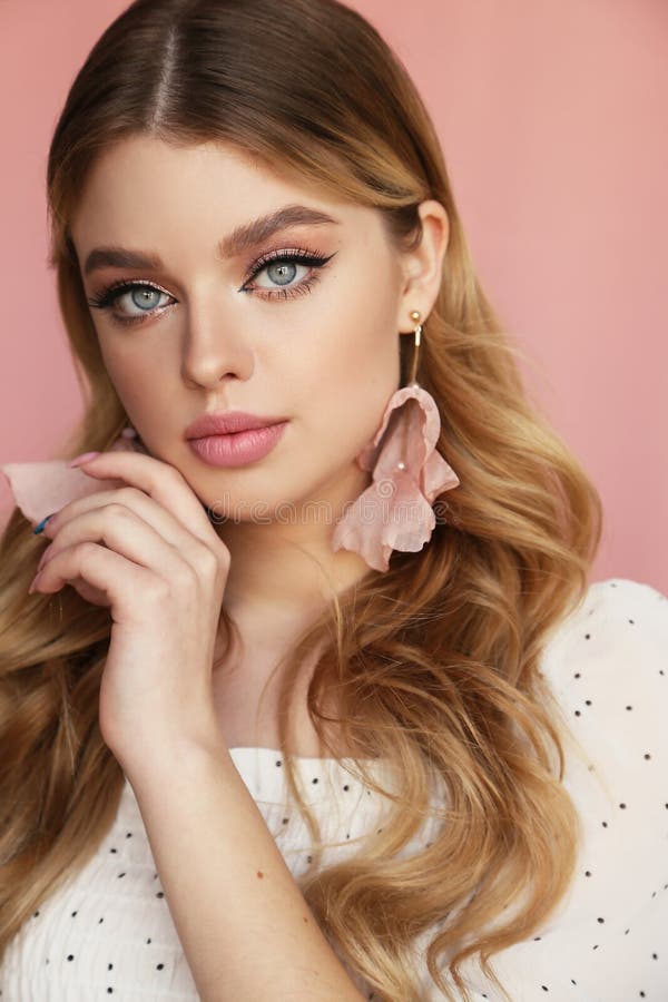 Beautiful Young Woman with Blond Natural Hair and Light Makeup Posing at Studio Stock Image - Image of glamour, elegant: 180468649 Beautiful Young Woman with Blond Natural Hair and Light Makeup Posing at Studio Stock Image - Image of glamour, elegant: 180468649