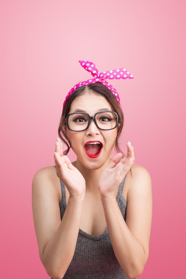 Fashion Portrait Of Asian Girl With Sunglasses Standing On Pink Stock