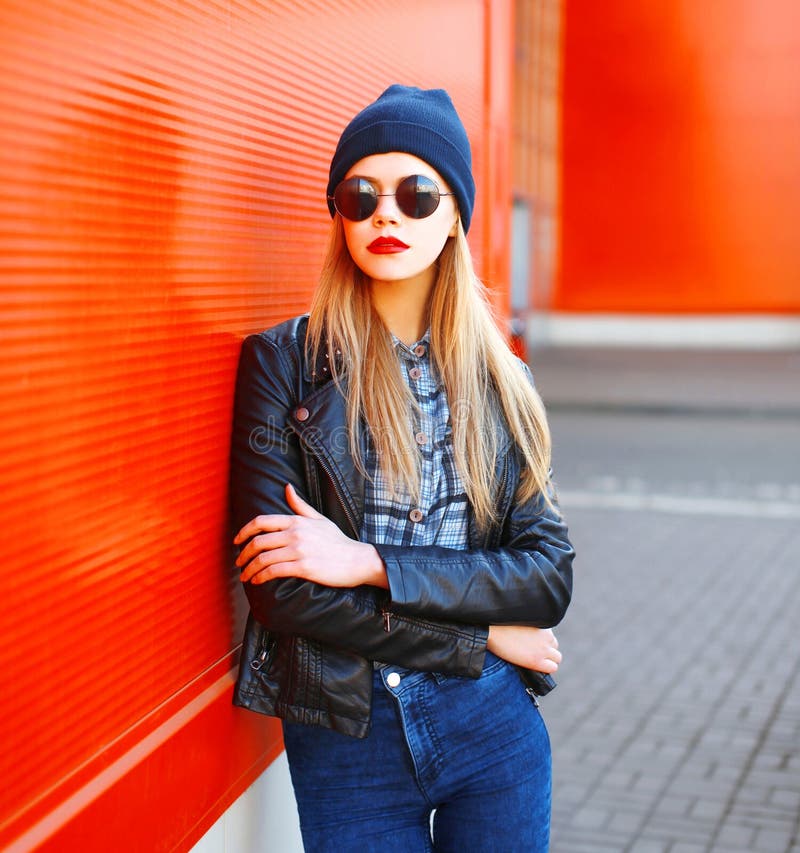 Portrait of a Beautiful Blonde Woman in a Blue Shirt on a Blue ...