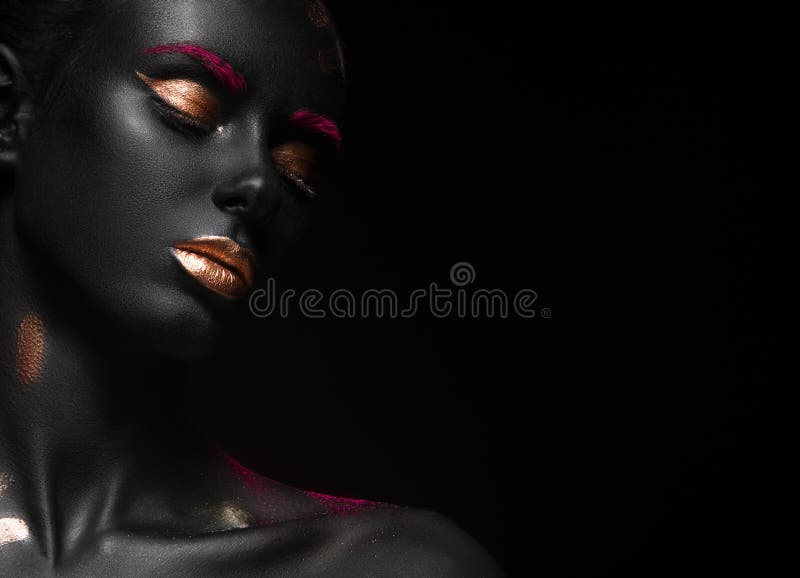 Fashion portrait of a dark-skinned girl with color