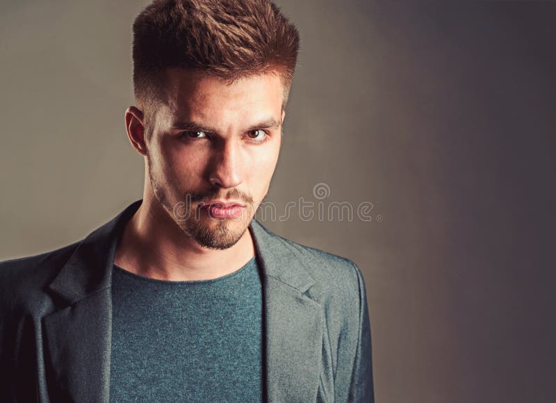 Fashion Portrait of Man. Fashion Man with Unshaven Beard. Facial Emotions. Male Grooming and Barber. Man Stock Image - Image of director, small: 139635821 Fashion Portrait of Man. Fashion Man with Unshaven Beard. Facial Emotions. Male Grooming and Barber. Man Stock Image - Image of director, small: 139635821