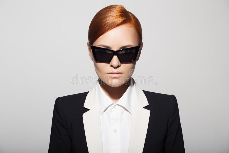 [Image: fashion-portrait-serious-woman-dressed-a...600876.jpg]