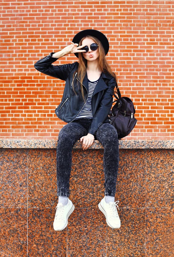 Fashion Pretty Cool Woman in Black Rock Style Over Bricks Stock Photo ...