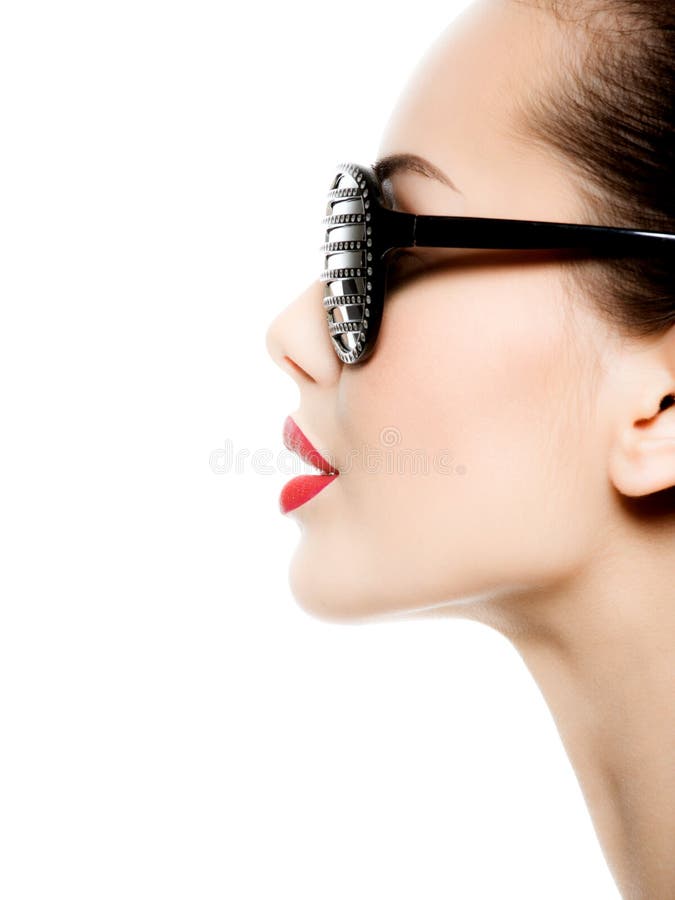 Fashion profile portrait of woman wearing black sunglasses royalty free stock image Fashion profile portrait of woman wearing black sunglasses royalty free stock image