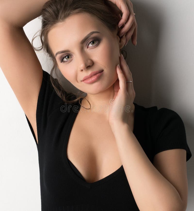 Fashion shot of woman wearing evening black dress