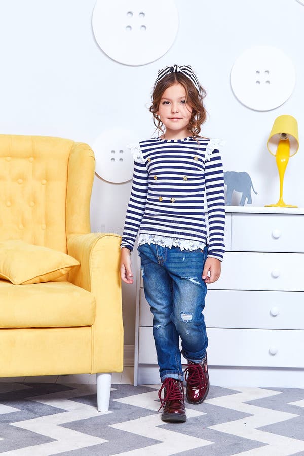 Fashion Style Clothes for Child Small Little Girl Wear Strip T-shirt Denim  Jeans Boots Hat Bow Cute Pretty Face Curly Hair Baby M Stock Photo - Image  of clothing, games: 111773758