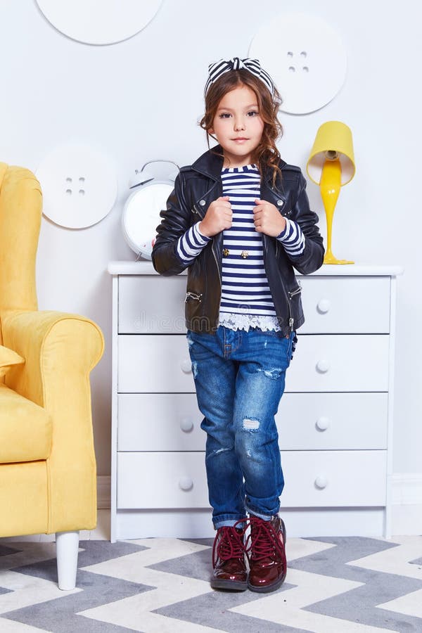 Fashion Style Clothes for Child Small Little Girl Wear Strip T-shirt Denim  Jeans Lather Jacket Boots Hat Bow Cute Pretty Face Cur Stock Photo - Image  of fashion, games: 111773344