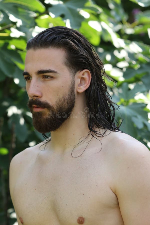 Young, Attractive Male Model with Long Hair and Beard Posing in Nature.  Stock Photo - Image of hair, athletic: 183549612