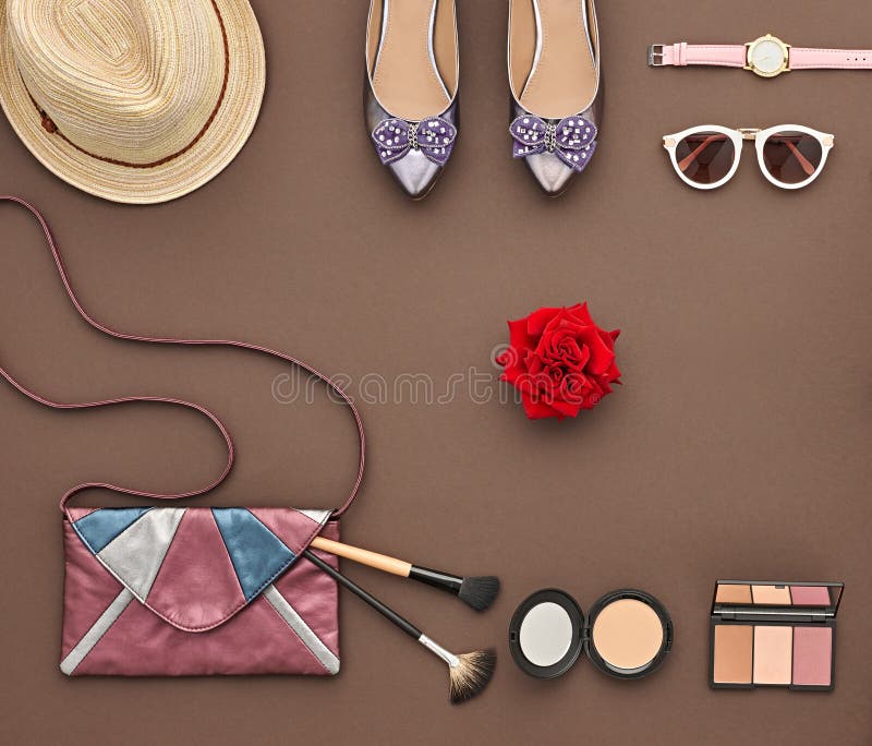 Trendy fashion Design Outfit. Fashion Lady Accessories Set. Essentials Fashion Cosmetic Makeup. Stylish Glamor Handbag, Trendy Shoes, Sunglasses Watches Rose. Top view. Creative fashion Overhead. Trendy fashion Design Outfit. Fashion Lady Accessories Set. Essentials Fashion Cosmetic Makeup. Stylish Glamor Handbag, Trendy Shoes, Sunglasses Watches Rose. Top view. Creative fashion Overhead