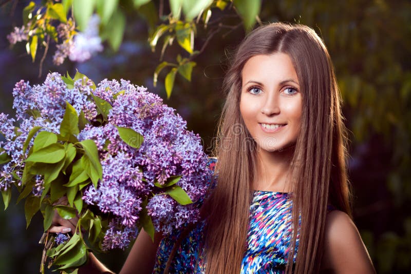 Fashion Young Woman with Lilac Flowers Stock Photo - Image of caucasian ...