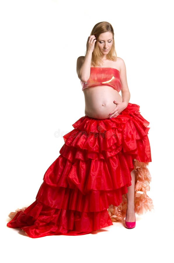 Fashionable beautiful pregnant in luxurious skirt