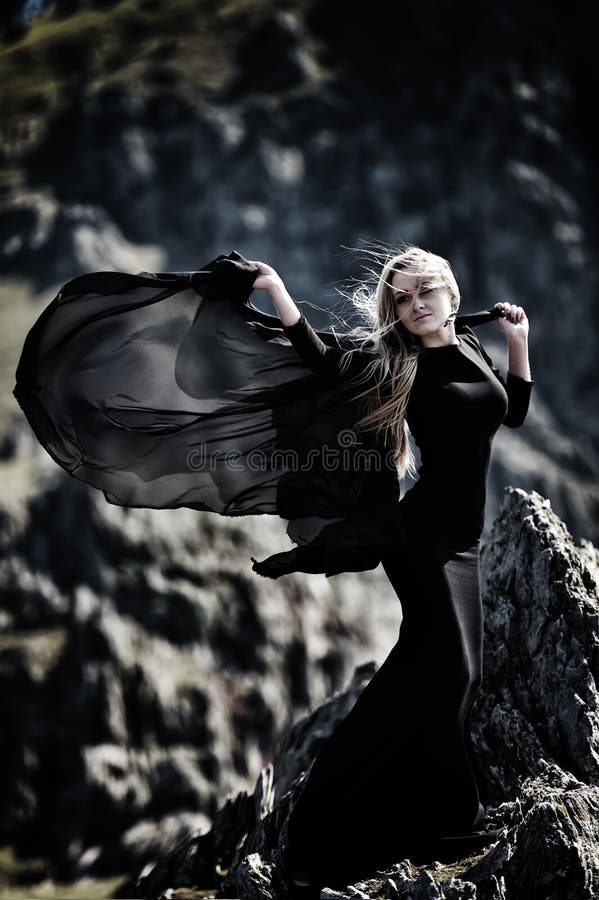 Fashionable beautiful woman with black dress outdoor royalty free stock image Fashionable beautiful woman with black dress outdoor royalty free stock image