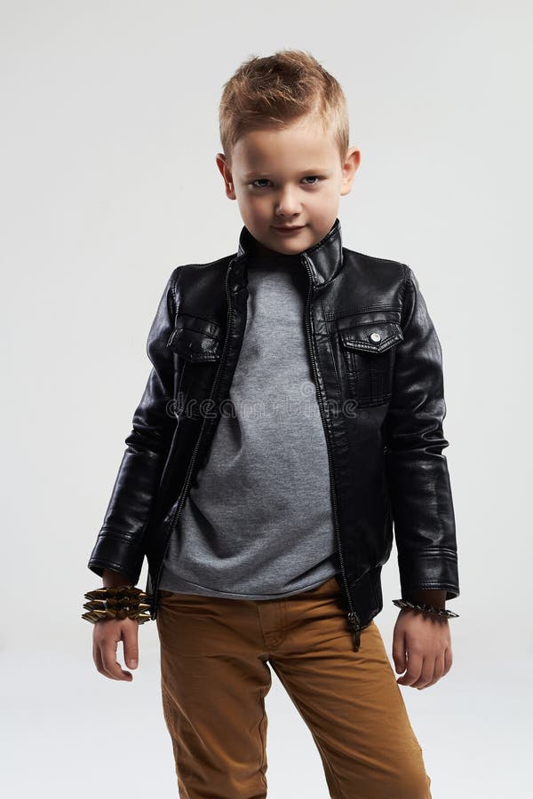 Fashionable Child in Leather Coat. Stylish Child with Trendy Haircut ...