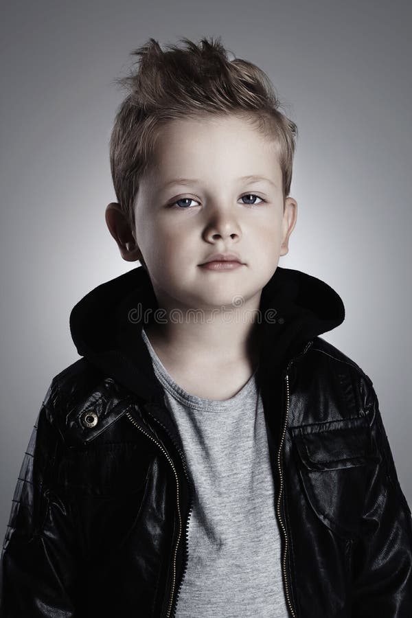 Fashionable child in leather coat.stylish little boy