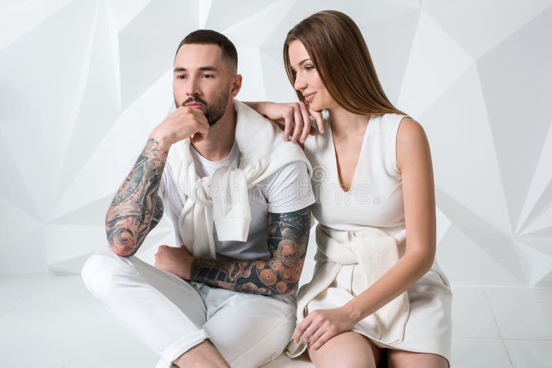 Fashionable couple posing at studio. royalty free stock photos Fashionable couple posing at studio. royalty free stock photos