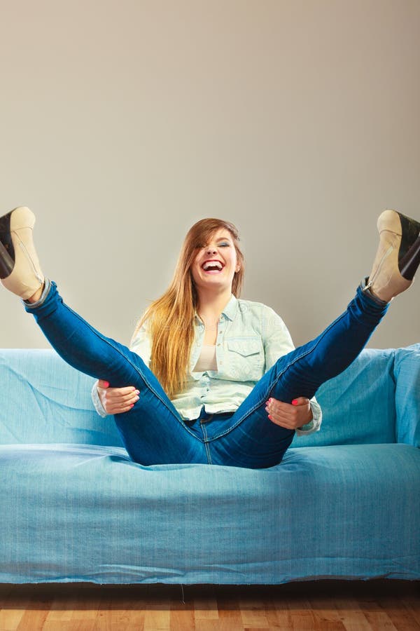 Fashionable Girl Wearing Denim Sitting On Couch Stock Image Image Of