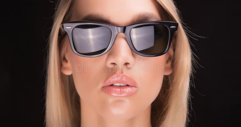 Fashionable glasses on blond girl