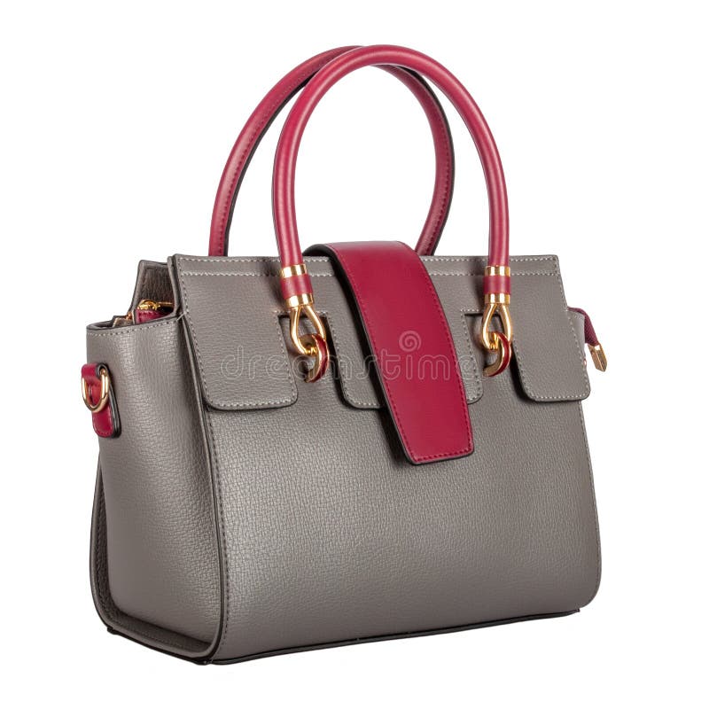 Fashionable gray classic ladies handbag of solid textured leather with a claret flap and inserts and gold accessories three-quarter view, isolated on a white background. Fashionable gray classic ladies handbag of solid textured leather with a claret flap and inserts and gold accessories three-quarter view, isolated on a white background
