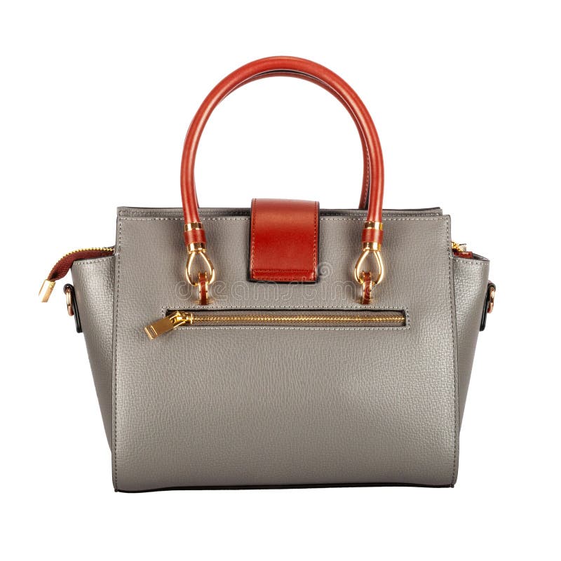 Fashionable gray classic women`s bag of textured leather with embossed stripes, large zipper and orange insets, isolated on white