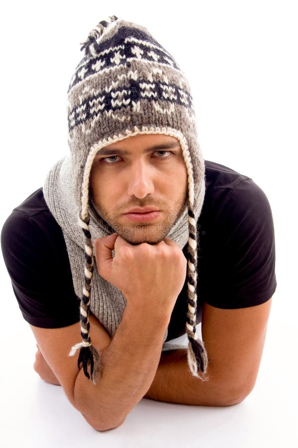 Fashionable man posing in woolen hat