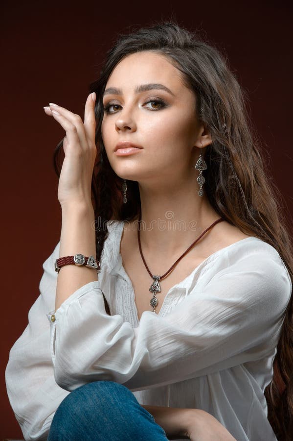 Fashionable model with collection silver accessory and jewelery