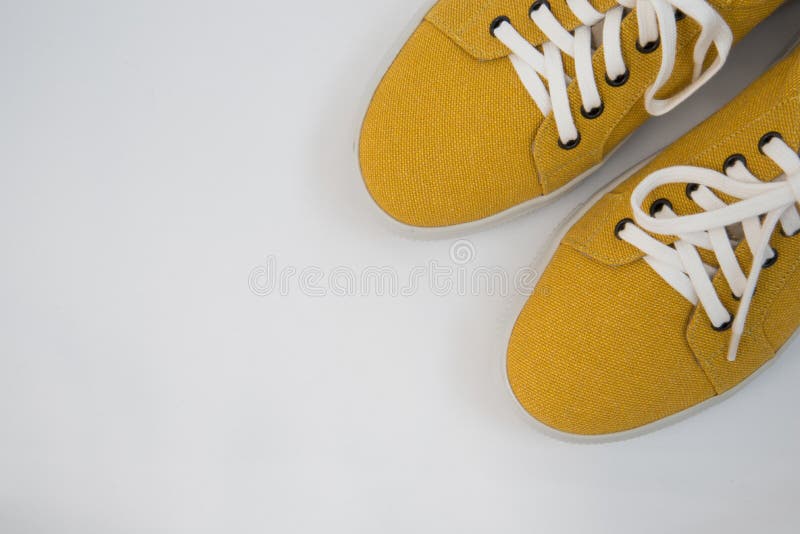 Top View of Fashionable Mustard-colored Shoes. the Shoes are on a Green ...