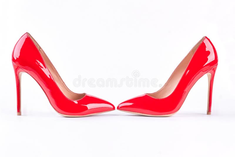 Fashionable Red High Heels Over White. Pair Of Female Red High-heeled Shoes  Isolated On White Background. Red Classic Stilettos. Stock Photo, Picture  and Royalty Free Image. Image 89255212.