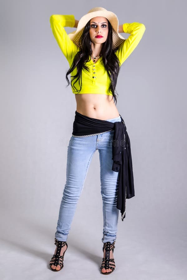 Fashionable slim women isolated on grey background royalty free stock images Fashionable slim women isolated on grey background royalty free stock images