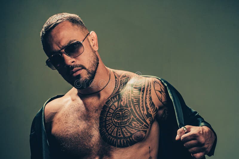 Fashionable Tattoo. Muscular Hispanic Man with Tattoo on Chest. Strong  Latino Man with Tattoo on Skin Stock Image - Image of model, energy:  200555299