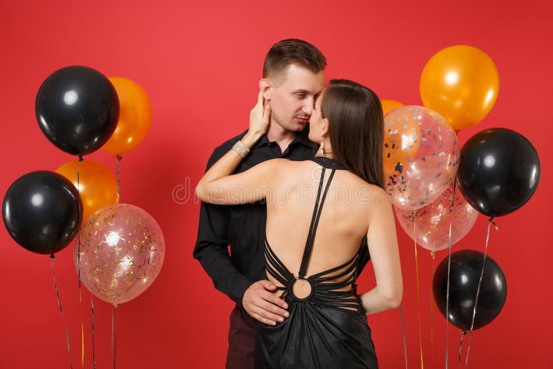 Fashionable Young Couple in Black Clothes Shirt Dress Celebrating Birthday  Holiday Party on Bright Red Stock Image - Image of male, impassioned:  140084547