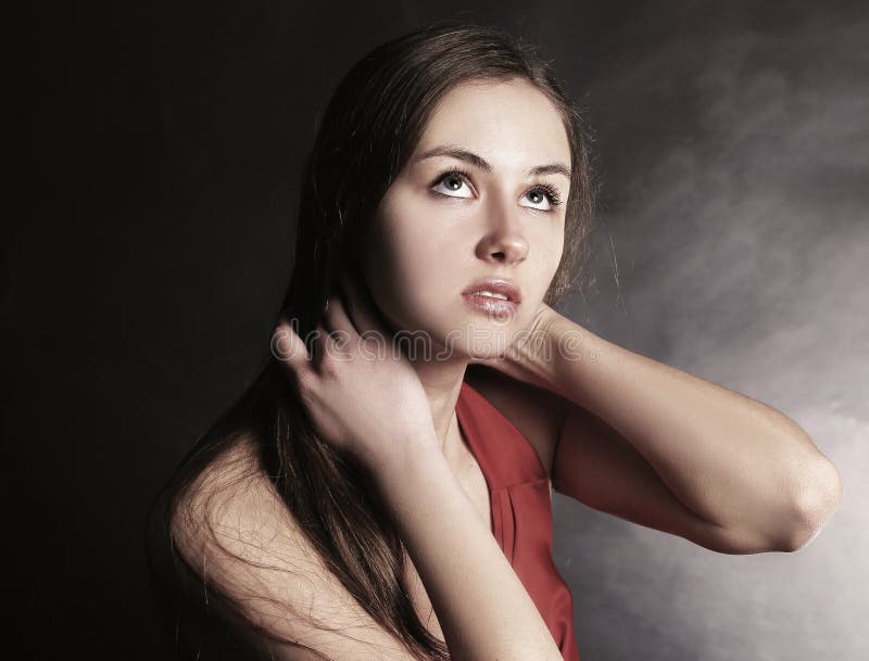 Fashionable Young Woman In Red Dress Looking At Copy Space. Iso Stock ...