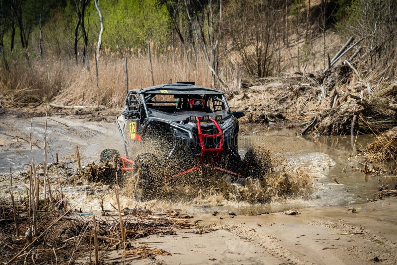 Fast ATV and UTV Driving in Mud and Water. Quad Racing, ATV 4x4 Stock