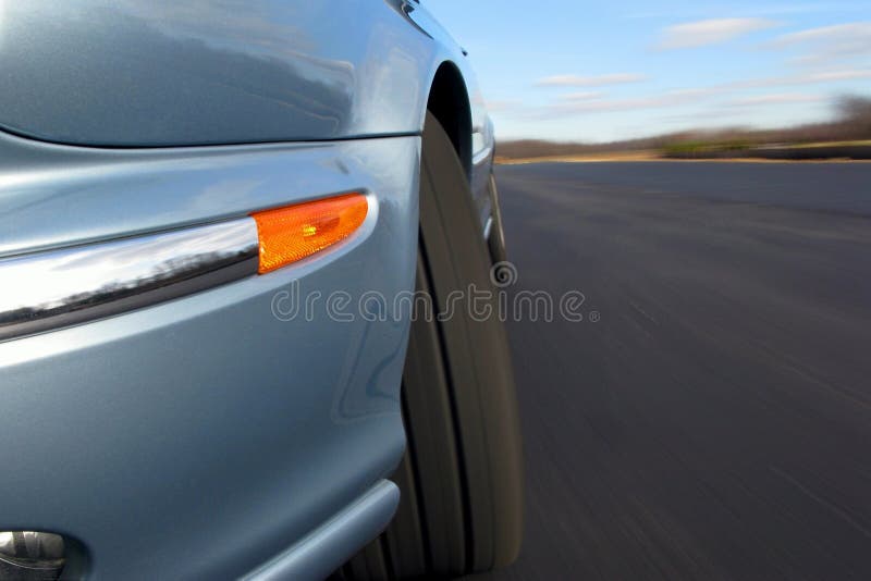 Fast Car Speeding on a Road with Real Motion Blur royalty free stock image Fast Car Speeding on a Road with Real Motion Blur royalty free stock image